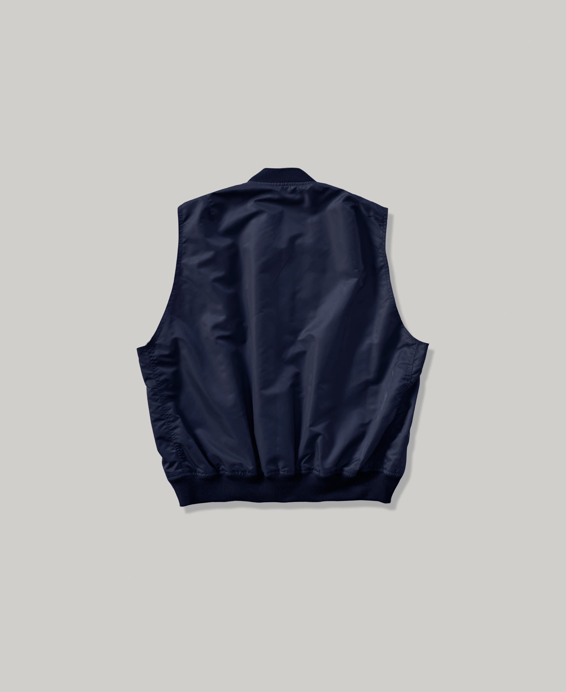 NON-PADDED SLEEVE-LESS BOMBER JACKET  | VINTAGE WASH NAVY